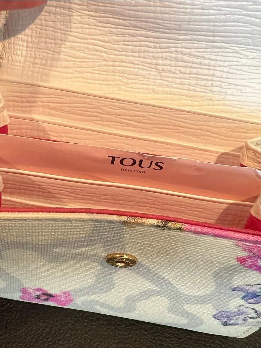 TOUS Cream Wallet with Pink Floral Accents and Gold Logo